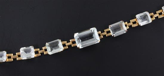 A Brazilian gold and aquamarine set bracelet, 6.5in.